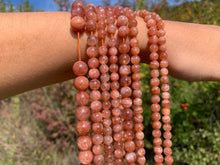 Charger l'image dans la galerie, Perles en pierre de soleil entre 6 et 10mm