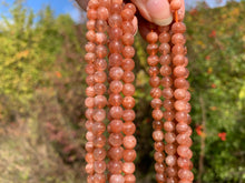 Charger l'image dans la galerie, Perles en pierre de soleil entre 6 et 10mm