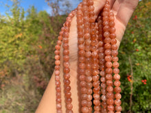 Charger l'image dans la galerie, Perles en pierre de soleil entre 6 et 10mm