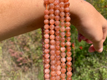 Charger l'image dans la galerie, Perles en pierre de soleil entre 6 et 10mm
