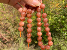 Charger l'image dans la galerie, Perles en pierre de soleil entre 6 et 10mm