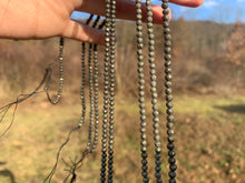 Charger l'image dans la galerie, Perles en pyrite facettées entre 2,5 et 4mm