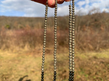 Charger l'image dans la galerie, Perles en pyrite facettées entre 2,5 et 4mm