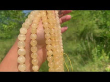 Charger et lire la vidéo dans la visionneuse de la Galerie, Perles en calcite jaune entre 6 et 10mm