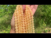 Charger et lire la vidéo dans la visionneuse de la Galerie, Perles en calcite jaune entre 6 et 10mm
