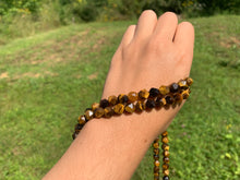Charger l'image dans la galerie, Perles en oeil de tigre, forme diamant entre 6 et 12mm
