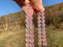 Charger l'image dans la galerie, Perles en quartz rose facettées transparentes entre 4 et 12mm