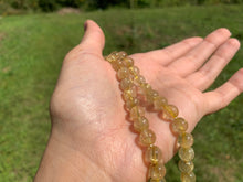 Charger l'image dans la galerie, Perles à inclusions de rutile entre 6 et 8mm QRT