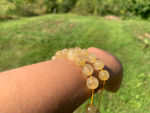 Charger l'image dans la galerie, Perles en quartz à inclusions de rutile entre 4 et 12mm QRU