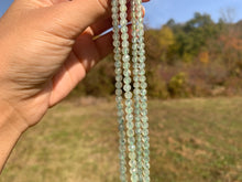 Charger l'image dans la galerie, Perles en prehnite facettées entre 2 et 10mm