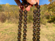 Charger l'image dans la galerie, Perles en quartz fumé entre 2 et 20mm