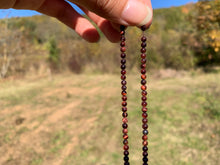 Charger l'image dans la galerie, Perles en oeil de taureau entre 2 et 18mm