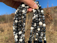 Charger l'image dans la galerie, Perles en jaspe zebré noir entre 4 et 12mm