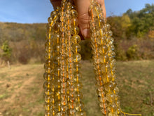 Charger l'image dans la galerie, Perles en quartz à inclusions de rutile entre 6 et 12mm QRD