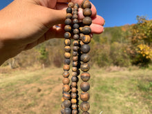 Charger l'image dans la galerie, Perles en oeil de tigre mate entre 6 et 10mm