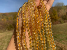 Charger l'image dans la galerie, Perles à inclusions de rutile entre 6 et 8mm QRT