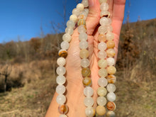 Charger l'image dans la galerie, Perles en aragonite entre 4 et 12mm