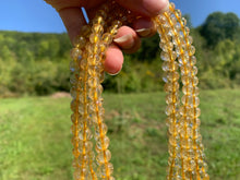 Charger l'image dans la galerie, Perles à inclusions de rutile entre 6 et 8mm QRT