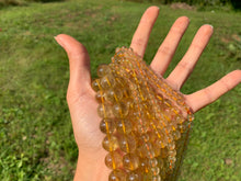 Charger l'image dans la galerie, Perles en quartz à inclusions de rutile entre 6 et 12mm QRD