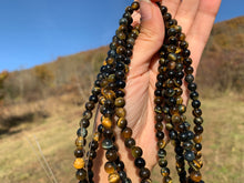 Charger l'image dans la galerie, Perles en oeil de tigre mélangé avec de l'oeil de faucon entre 6 et 10mm