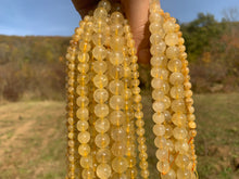 Charger l'image dans la galerie, Perles en quartz à inclusions de rutile entre 4 et 12mm QRU