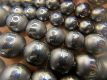 Charger l'image dans la galerie, Perles en hématite avec un aspect mate et polie entre 6 et 12mm
