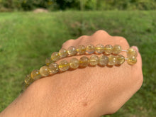 Charger l'image dans la galerie, Perles à inclusions de rutile entre 6 et 8mm QRT