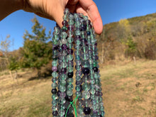 Charger l'image dans la galerie, Perles en fluorite entre 6 et 12mm