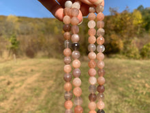 Charger l'image dans la galerie, Perles en pierre de lune multicolore facettée entre 6 et 10mm