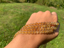 Charger l'image dans la galerie, Perles en quartz à inclusions de rutile entre 6 et 12mm QRD