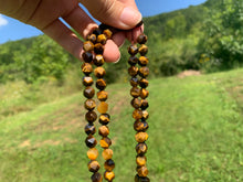 Charger l'image dans la galerie, Perles en oeil de tigre, forme diamant entre 6 et 12mm