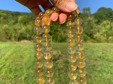 Charger l'image dans la galerie, Perles en quartz à inclusions de rutile entre 6 et 12mm QRD