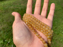 Charger l'image dans la galerie, Perles en quartz à inclusions de rutile entre 4 et 12mm QRU