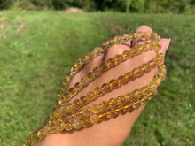 Charger l'image dans la galerie, Perles à inclusions de rutile entre 6 et 8mm QRT