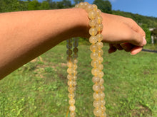 Charger l'image dans la galerie, Perles en quartz à inclusions de rutile entre 4 et 12mm QRU