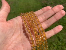 Charger l'image dans la galerie, Perles à inclusions de rutile entre 6 et 8mm QRT