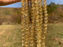 Charger l'image dans la galerie, Perles à inclusions de rutile entre 6 et 8mm QRT