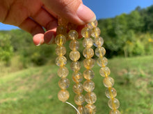 Charger l'image dans la galerie, Perles à inclusions de rutile entre 6 et 8mm QRT