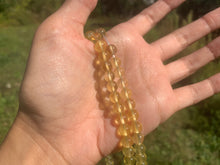 Charger l'image dans la galerie, Perles en fluorite jaune entre 6 et 10mm