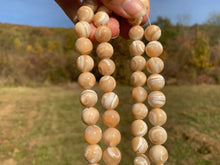 Charger l'image dans la galerie, Perles en nacre beige entre 2 et 12mm