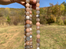 Charger l'image dans la galerie, Perles en pierre de lune multicolore facettée entre 6 et 10mm