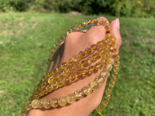 Charger l'image dans la galerie, Perles à inclusions de rutile entre 6 et 8mm QRT