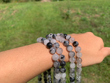 Charger l'image dans la galerie, Perles en quartz avec inclusions de tourmaline entre 4 et 12mm, QTU