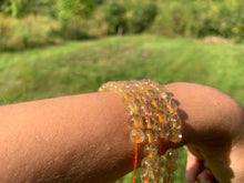 Charger l'image dans la galerie, Perles en quartz à inclusions de rutile entre 6 et 12mm QRD