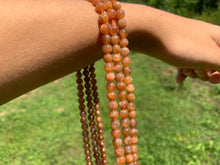 Charger l'image dans la galerie, Perles en pierre de soleil entre 6 et 8mm