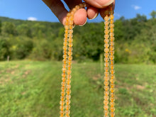 Charger l'image dans la galerie, Perles en quartz à inclusions de rutile entre 4 et 12mm QRU