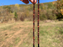 Charger l'image dans la galerie, Perles en oeil de taureau entre 2 et 18mm