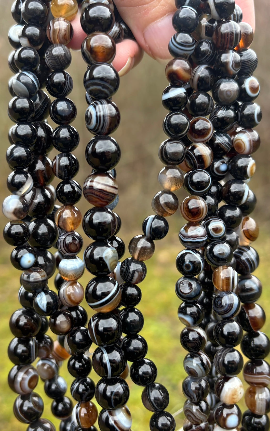 Perles en agate rubanée entre 8 et 10mm