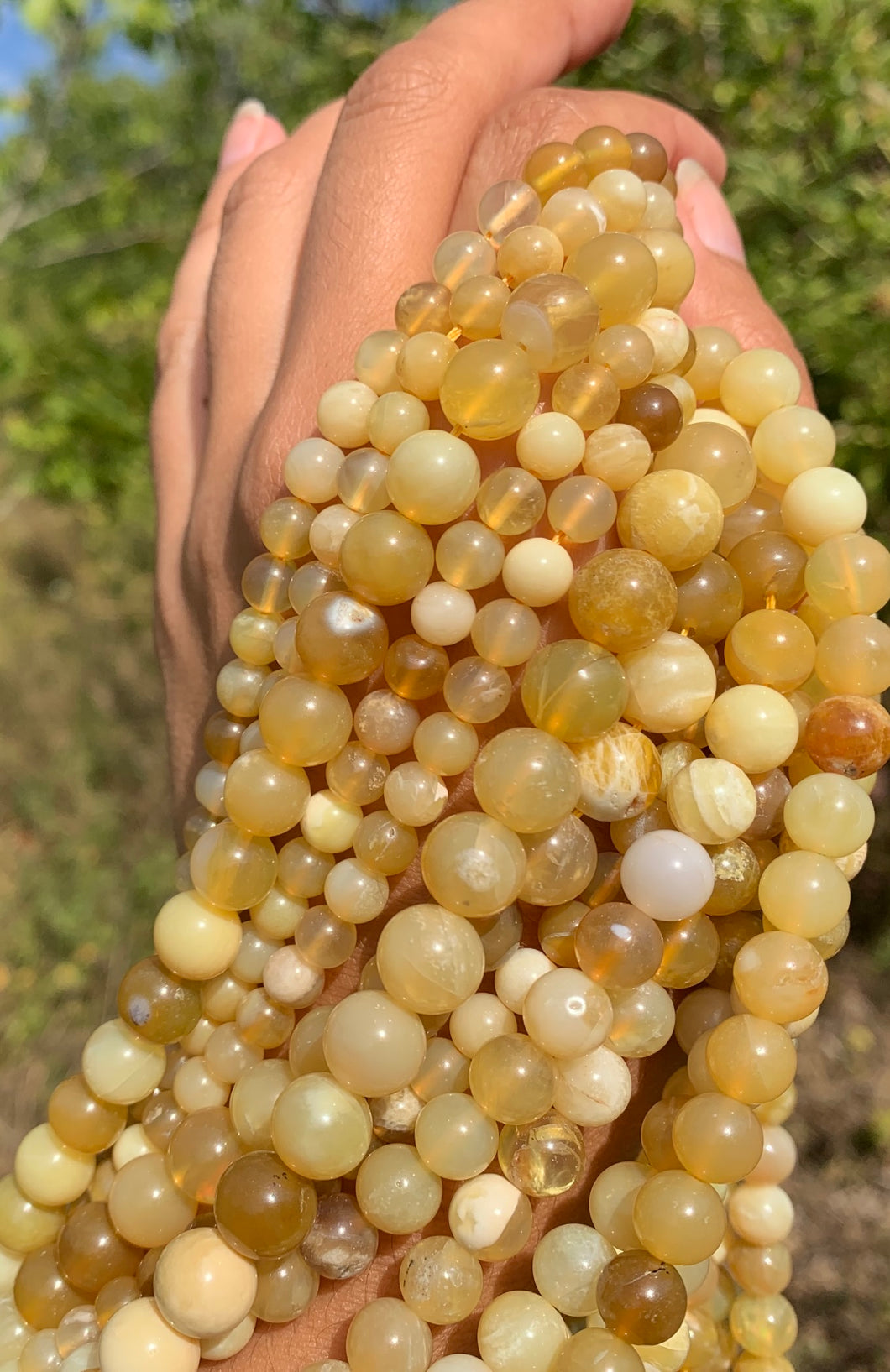 Perles en opale commune jaune entre 6 et 10mm