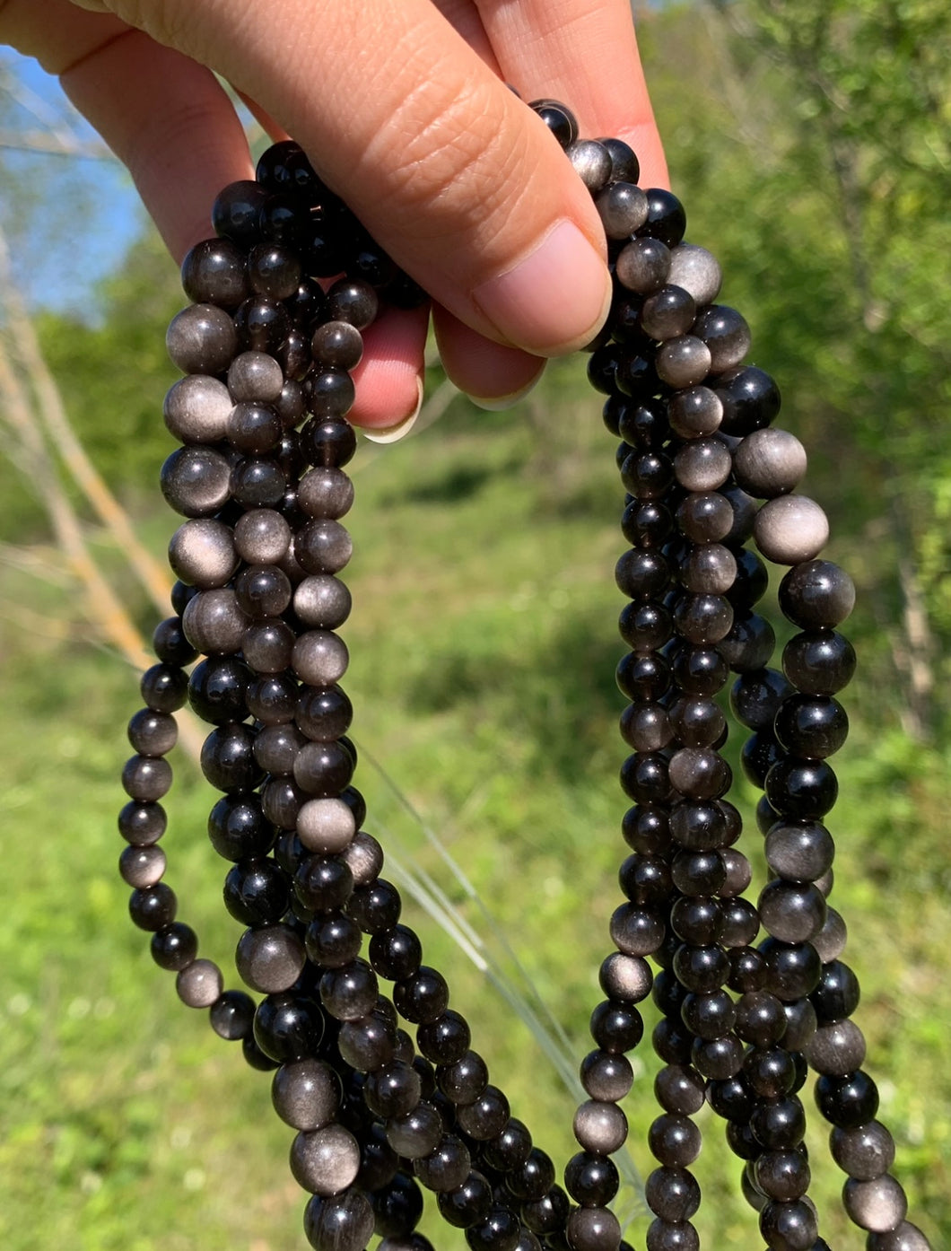 Perles en obsidienne argentée entre 6 et 8mm OAD